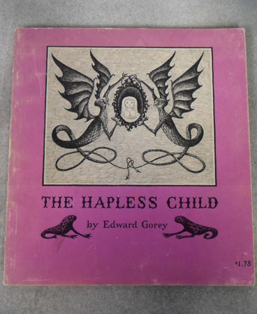Edward Gorey's "The Hapless Child" First British Edition, Rare edition published in 1961 by Anthony Blond Ltd but has Obolensky wrapper $95.00