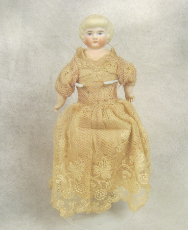 9.5" Parian with time period outfit (frail) and newer silk dress (shown) with elaborate snood hair style $895.00