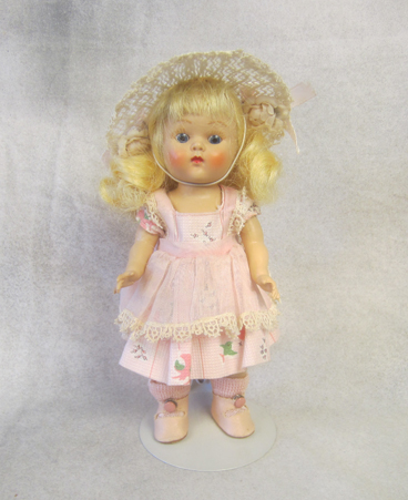 Ginny painted lash strung doll in original tagged complete mint outfit, high color. $265.00