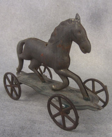 1870s George Brown Horse on Platform Tin Toy $55.00