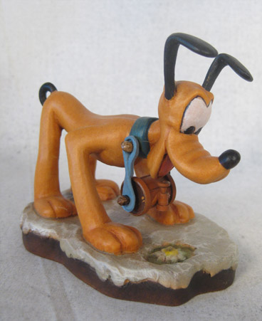 Anri Pluto wth keg carved wooden figure