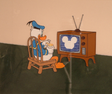 Donald Duck watching TV with Disney channel logo. 10" x 8" image size. opening for disney channel show in tv. Framed. $695.00