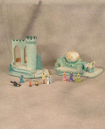 Complete Goebel Cinderella set includes: Cinderella, Prince Charming, Fairy Godmother, Jaq, Gus, Lucifer, Anastasia, Drizella, Stepmother, Footman and Cinderella's Coach and Castle $1210.00