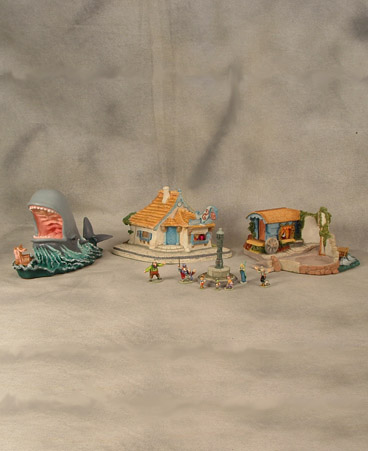 Complete Goebel Pinocchio set includes: Pinocchio, Jiminy Cricket, Blue Fairy, Gepetto & Figaro, Gideon, J.W.Foulfellow, Stromboli, Whale, Gepetto's Toy Shop, Stromboli's Wagon and Lamp Post $1215.00
