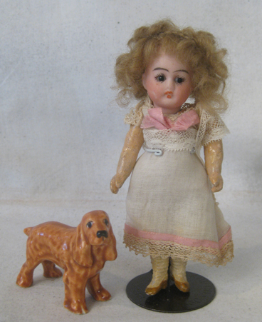 Miniature 5" German bisque doll, all original with glass eyes 18/0 $195.00