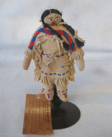 5.5" Mid-Century Blackfeet doll with tag. 