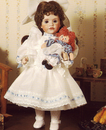 Marcellea Gruelle found a faceless doll in the attic upon which her father painted a face and created the first Raggedy Ann. This 13" doll commemorates Raggedy Ann's 70th anniversary. $450.00