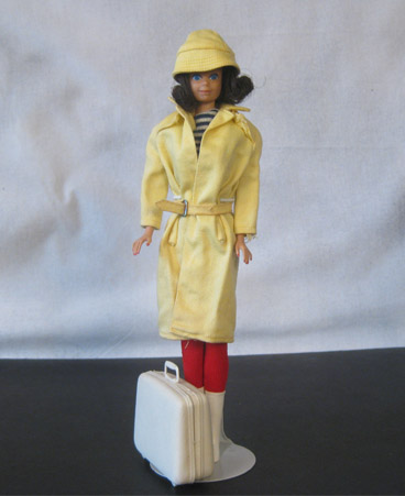 Midge in 1963 yellow coat and hat, ready for vacation. $45.00