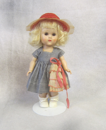 Brown eyed blonde molded lash walker Ginny in Medford Tag outfit. $125.00